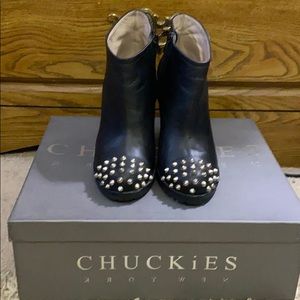 Wedge bootie in studs , in excellent condition .